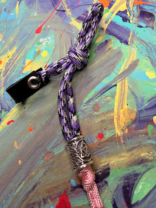 Purple & White Paracord EDC - Frameless Slingshot w/ Nordic Charm - Black Leather
