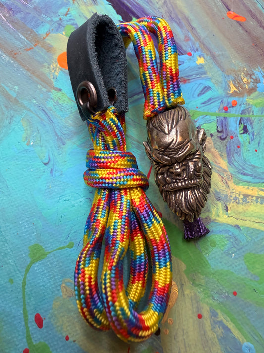 Rainbow Paracord EDC - Frameless Slingshot w/ Large Orc Head - Blue Leather