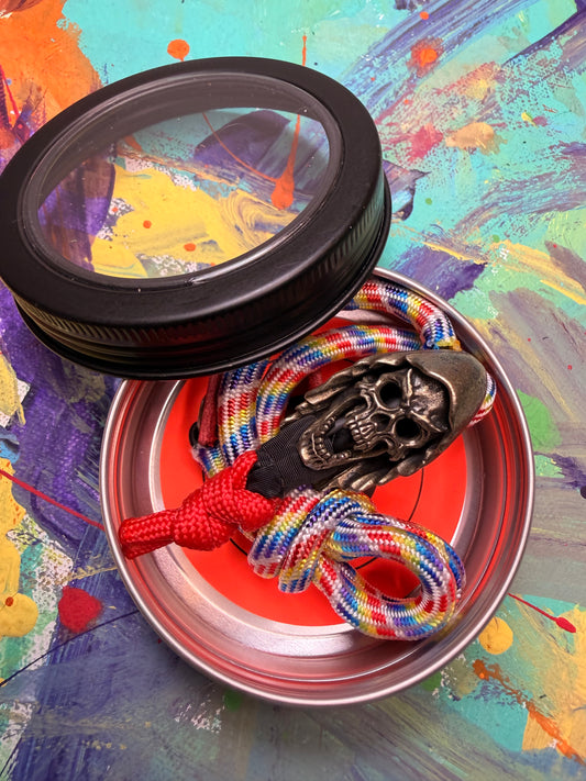 Multicolored Paracord EDC - Frameless Slingshot w/ Monster Skull Charm - Red Leather