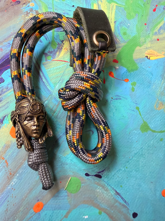 Gray & Orange Paracord EDC - Frameless Slingshot w/ Egyptian Queen Charm - Green Leather
