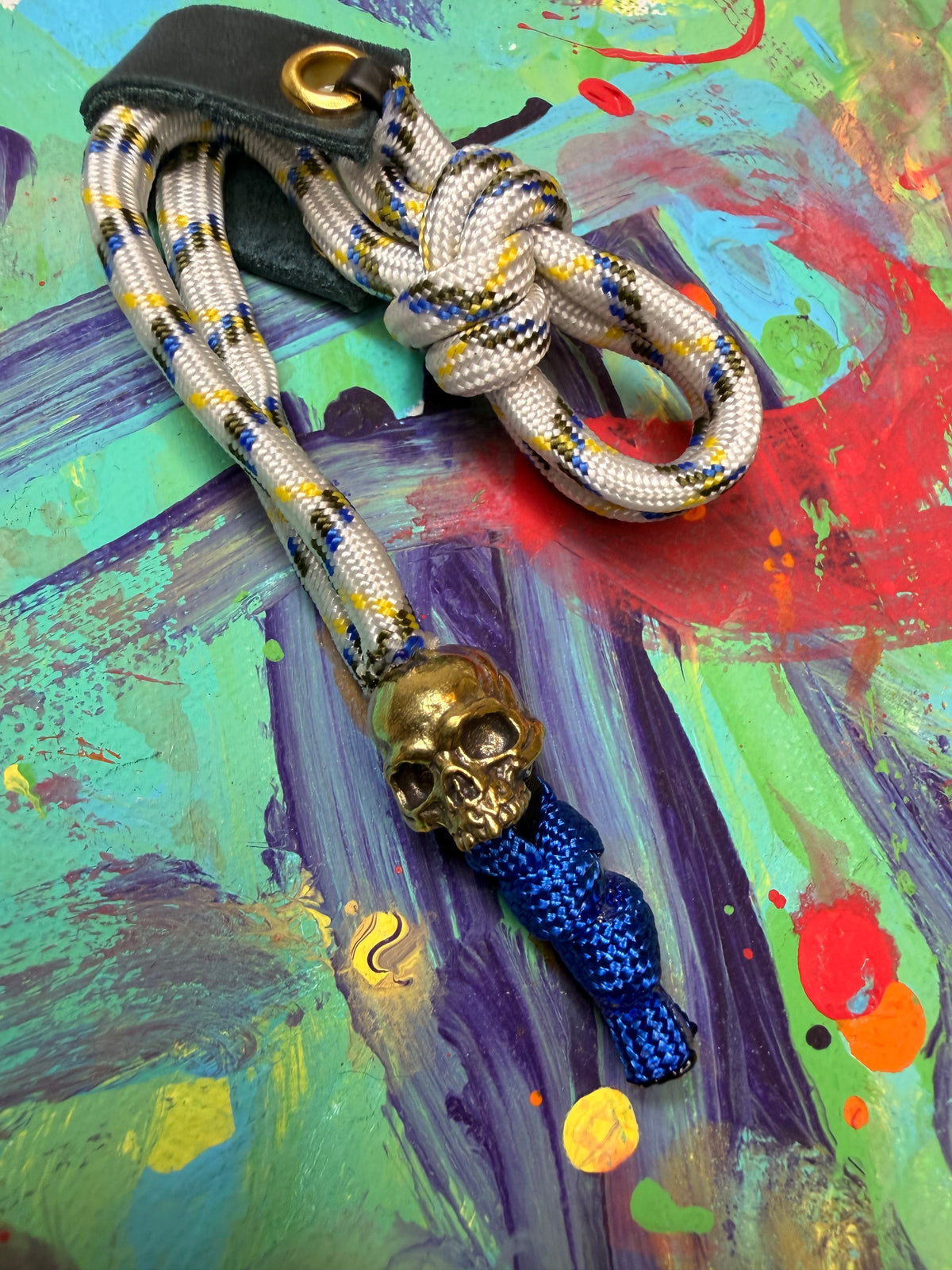 White & Blue Paracord EDC - Frameless Slingshot w/ Jawless Skull Charm - Blue Leather