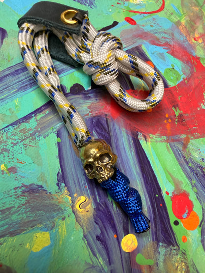 White & Blue Paracord EDC - Frameless Slingshot w/ Jawless Skull Charm - Blue Leather