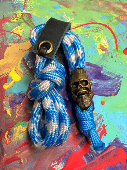 Blue & White Paracord EDC - Frameless Slingshot w/ Viking Skull Charm - Blue Leather