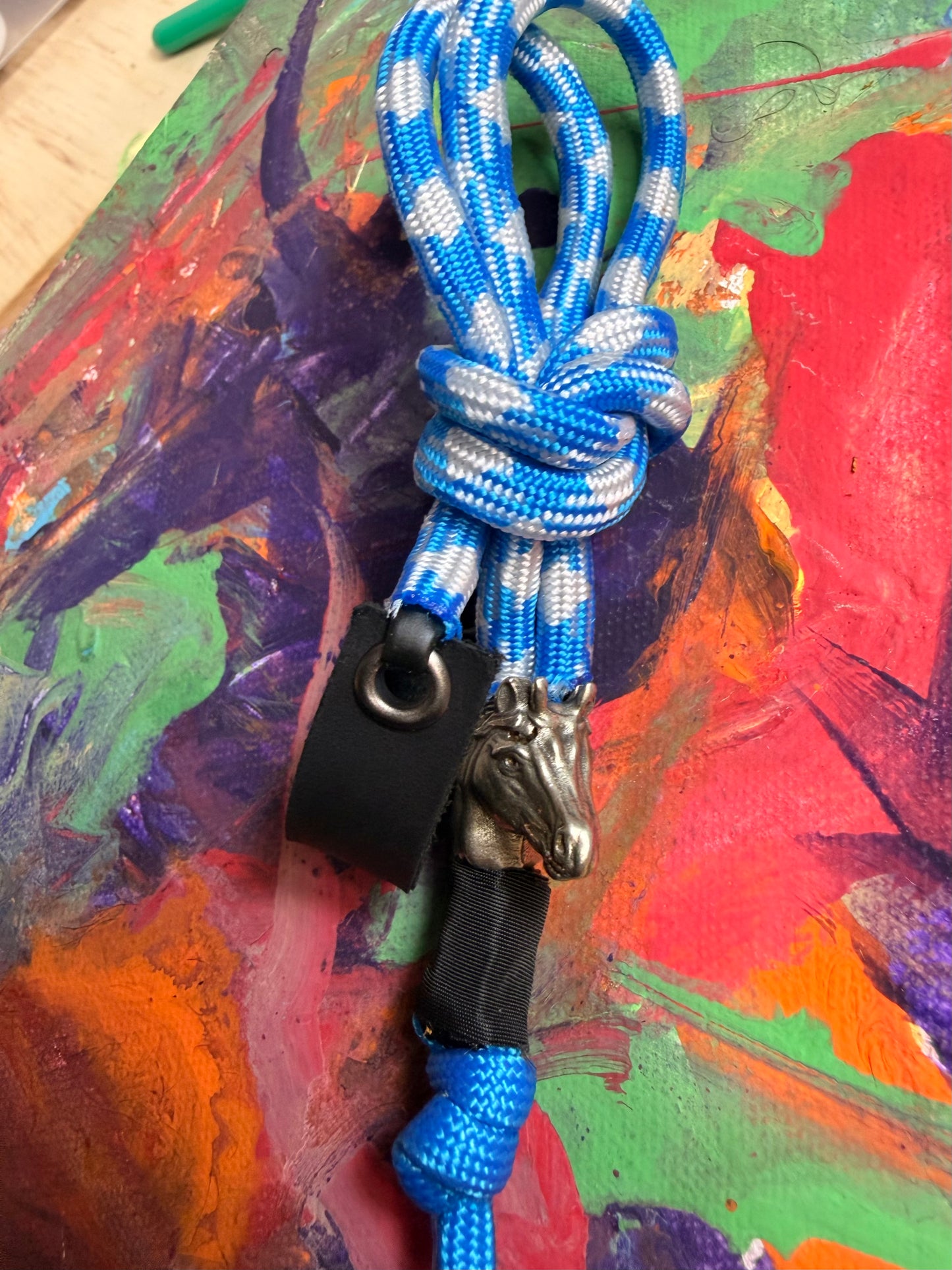 Blue & White Paracord EDC - Frameless Slingshot w/ Horse Charm - Black Leather