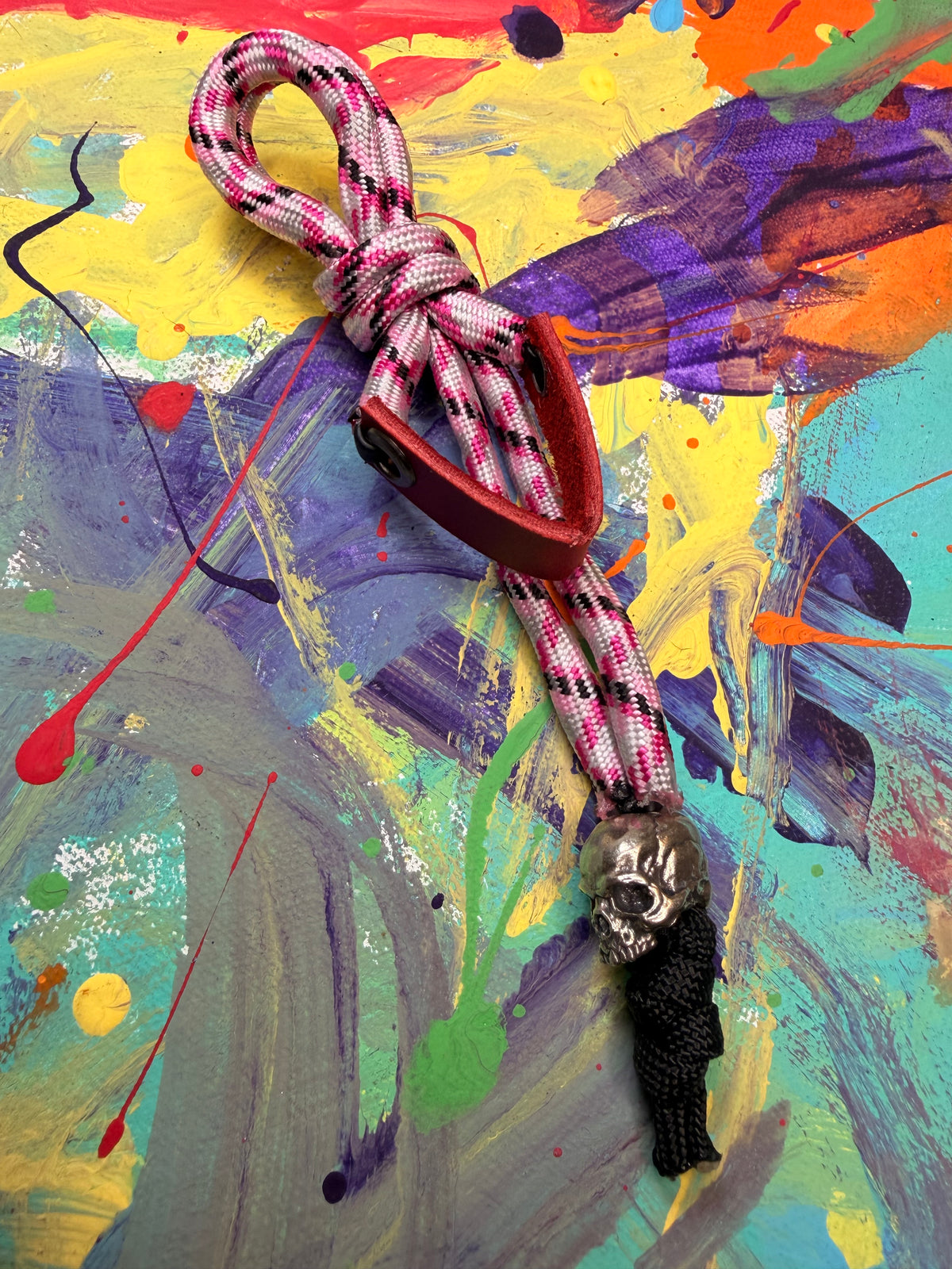 Pink & Black Paracord EDC - Frameless Slingshot w/ jawless Skull Charm - Red Leather