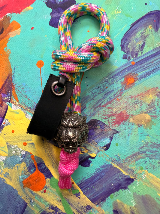 Pink/Yellow/Blue Paracord EDC - Frameless Slingshot w/ Tiger Charm - Black Leather