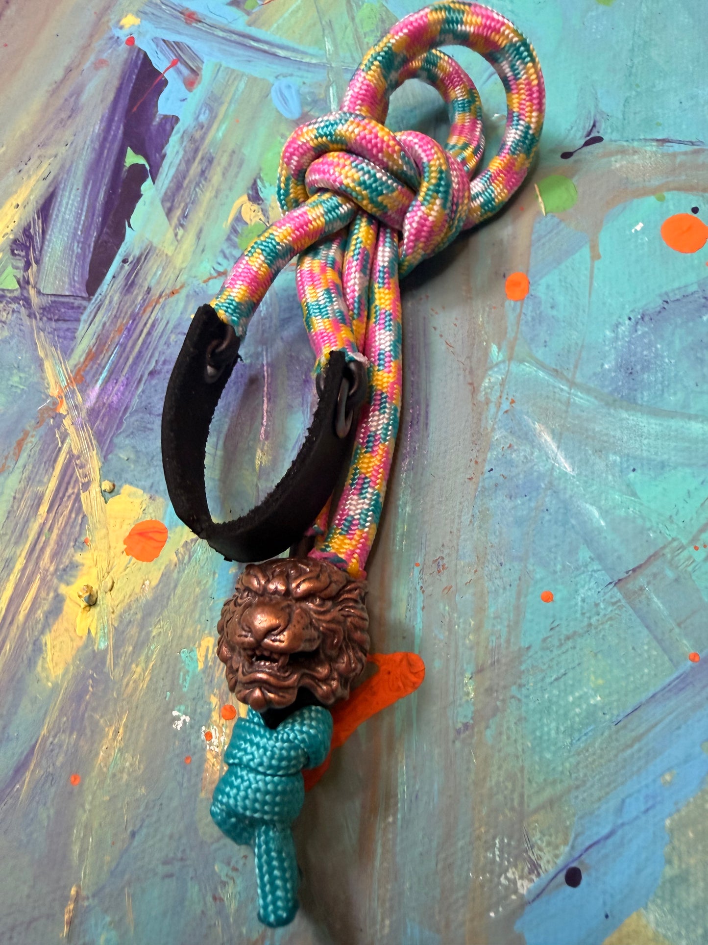 Pink/Yellow/Blue Paracord EDC - Frameless Slingshot w/ Tiger Charm - Black Leather
