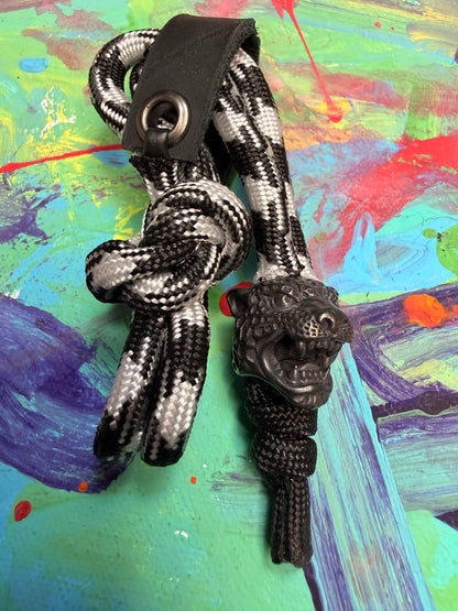 Black & White Paracord EDC - Frameless Slingshot w/ Jaguar Charm - Black Leather