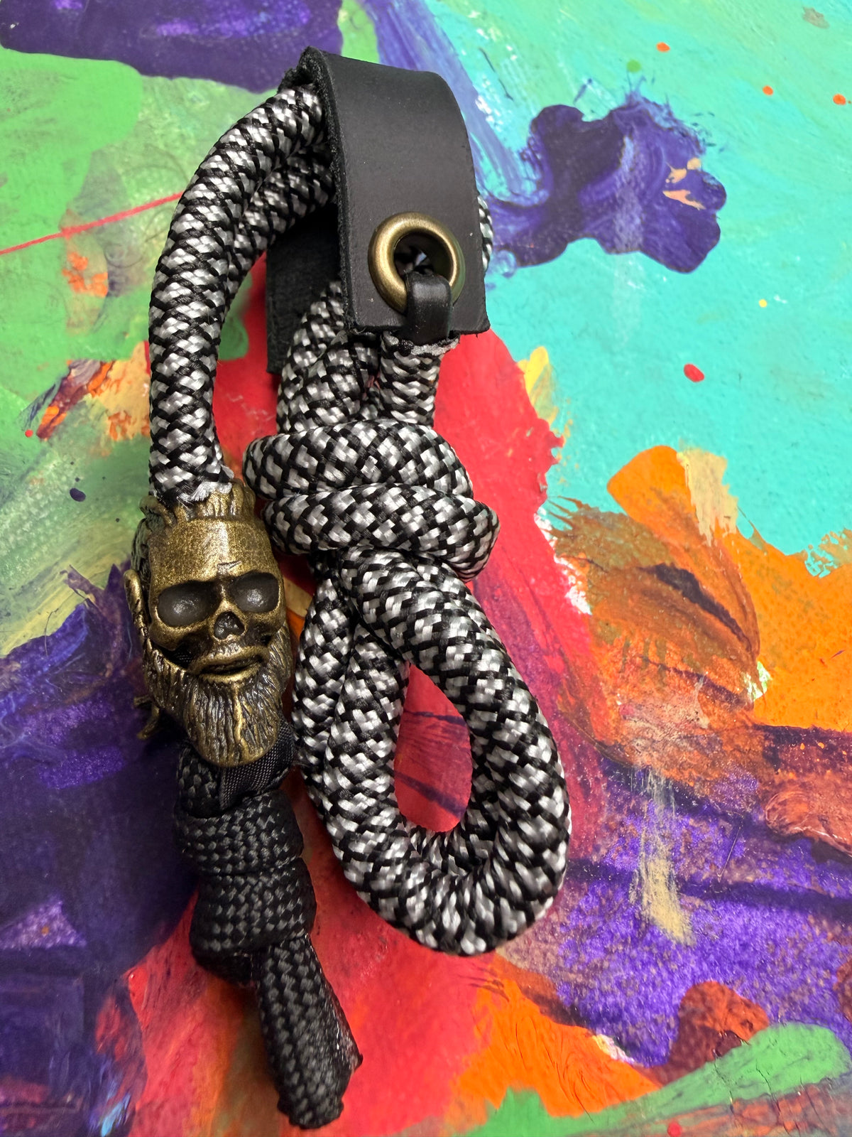Black & White Paracord EDC - Frameless Slingshot w/ Viking Skull Charm - Black Leather