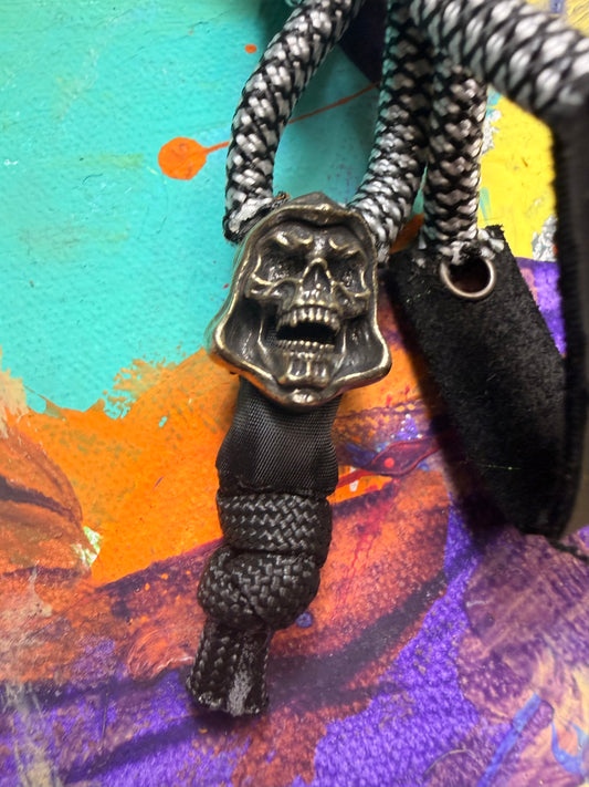 Black & White Paracord EDC - Frameless Slingshot w/ Skeletor Charm- Black Leather