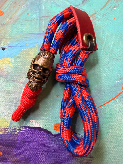 Red & Blue Paracord EDC - Frameless Slingshot w/ Viking Skull Charm - Red Leather