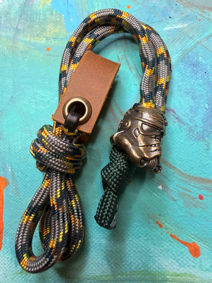 Gray & Green Paracord EDC - Frameless Slingshot w/ Storm Trooper Charm - Genuine Leather