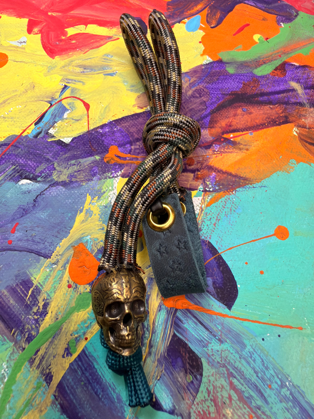 Dark Camo Paracord EDC - Frameless Slingshot w/ Skull Charm- Blue Leather