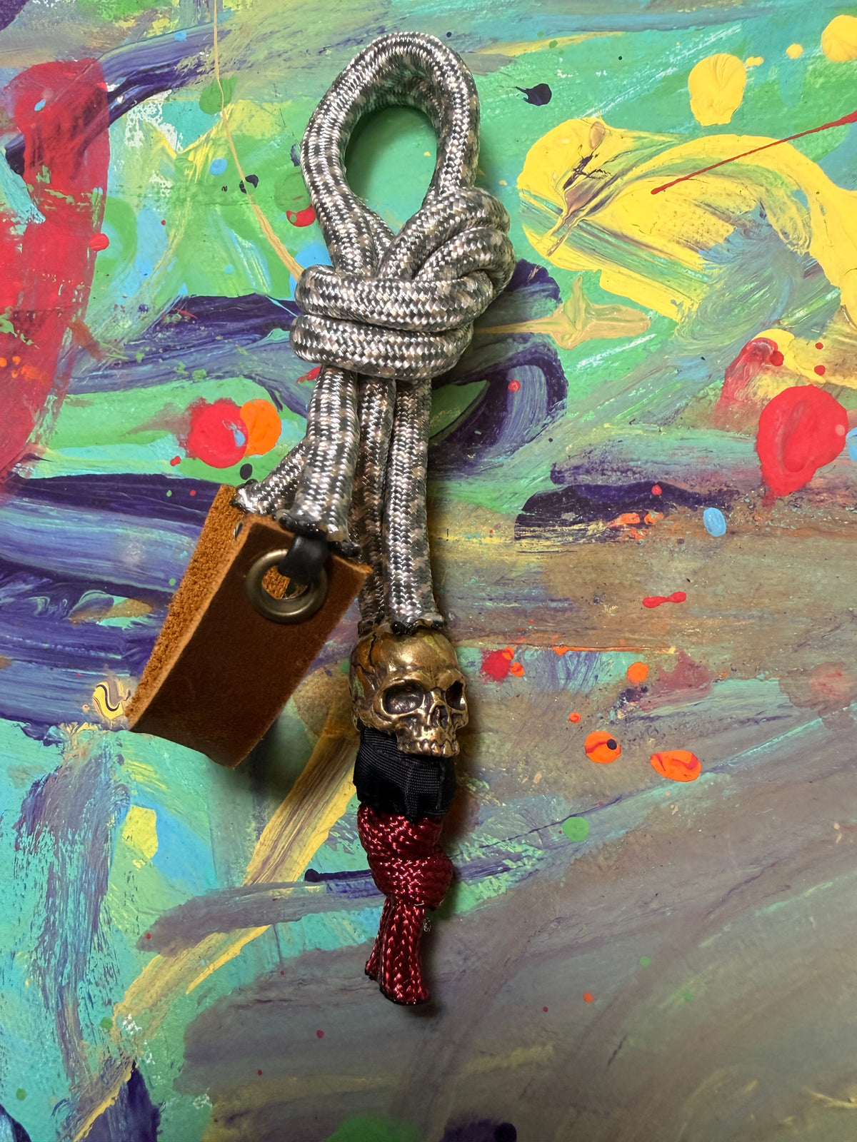 Gray & White Paracord EDC - Frameless Slingshot w/ jawless Skull Charm - Genuine Leather