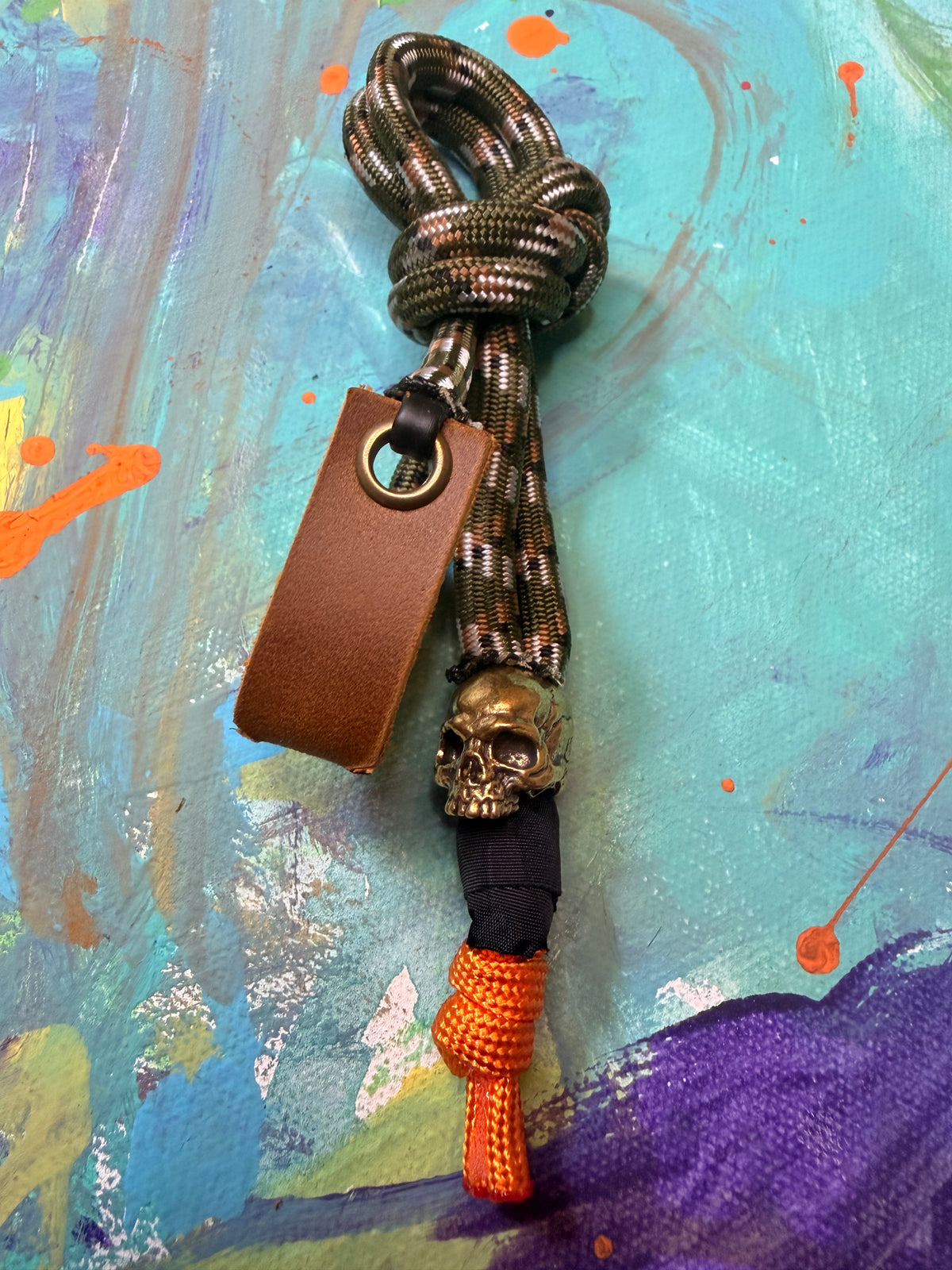 Green Camo Paracord EDC - Frameless Slingshot w/ Jawless Skull Charm - Genuine Leather