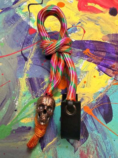 Orange/Green/Pink Paracord EDC - Frameless Slingshot w/ Skull Charm - Black Leather