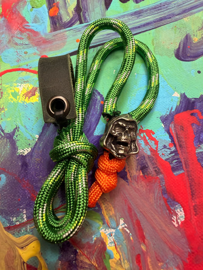 Green & Red Paracord EDC - Frameless Slingshot w/ Skeletor Charm- Green Leather