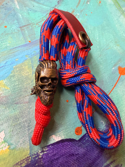 Red & Blue Paracord EDC - Frameless Slingshot w/ Viking Skull Charm - Red Leather