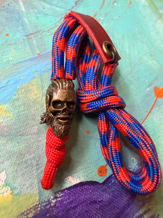 Red & Blue Paracord EDC - Frameless Slingshot w/ Viking Skull Charm - Red Leather