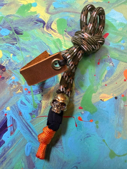 Green Camo Paracord EDC - Frameless Slingshot w/ Jawless Skull Charm - Genuine Leather