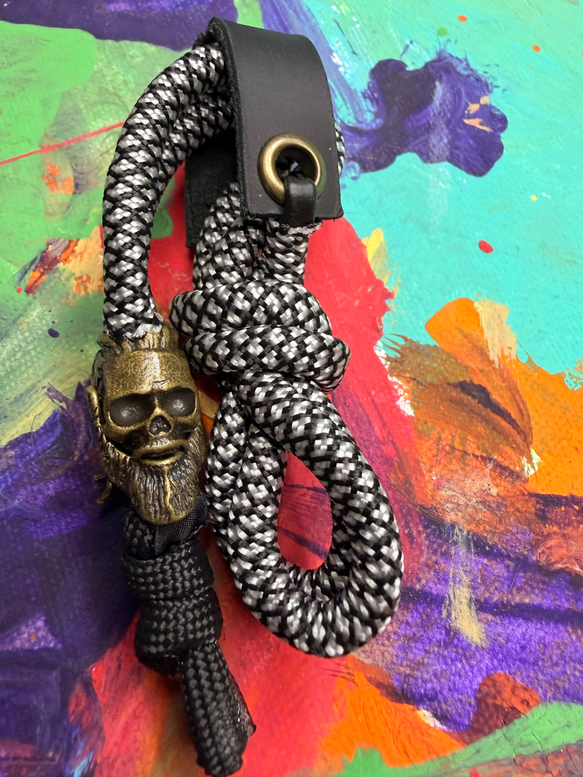 Black & White Paracord EDC - Frameless Slingshot w/ Viking Skull Charm - Black Leather