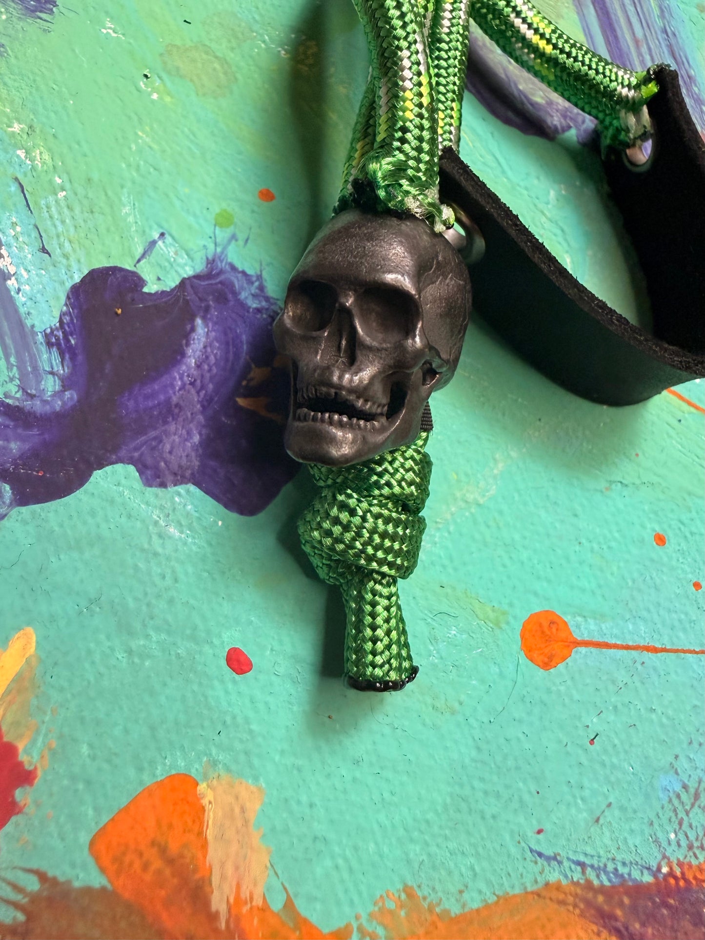 Green Paracord EDC - Frameless Slingshot w/ Black Skull Charm- Black Leather