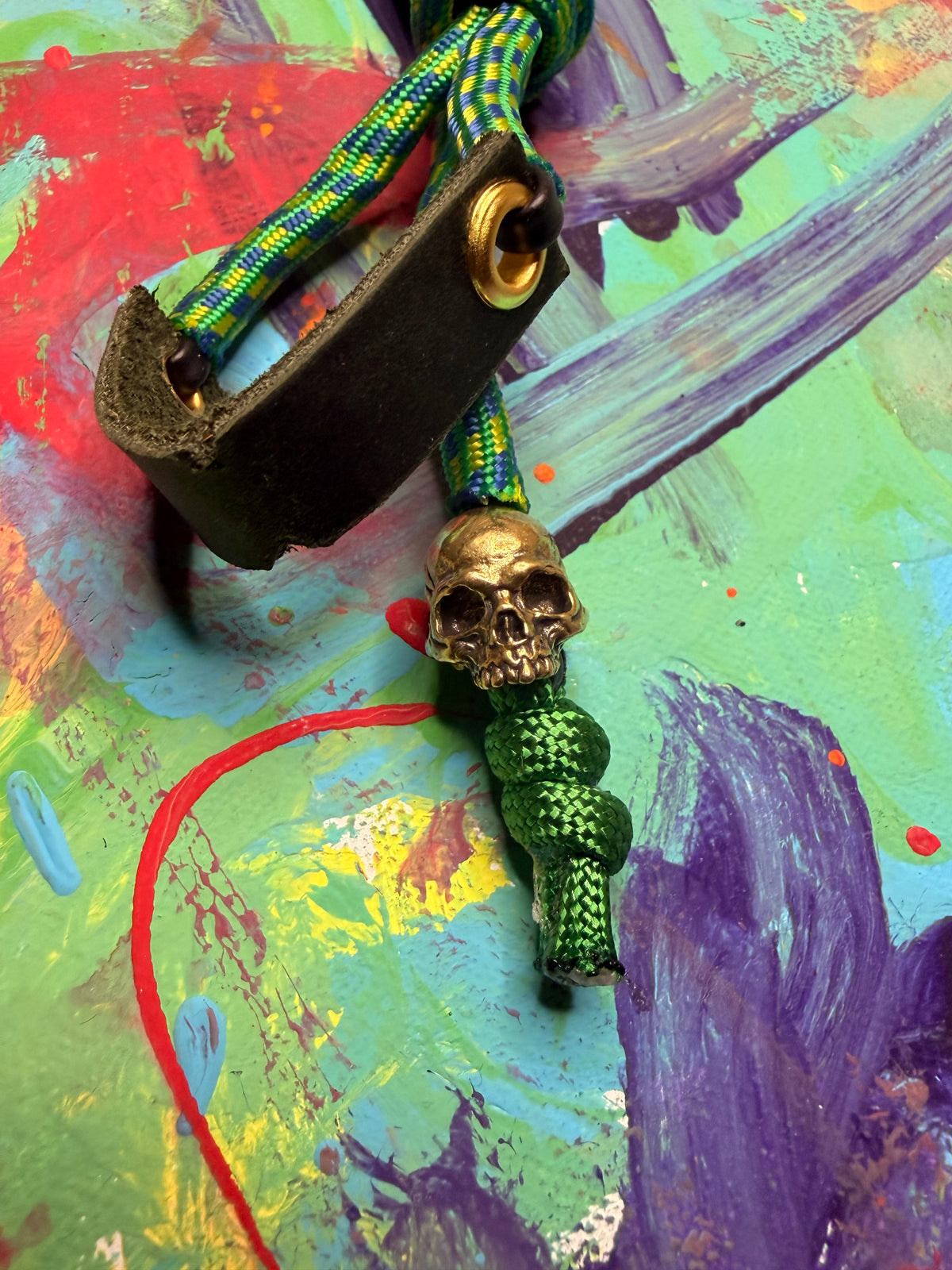 Green & Blue Paracord EDC - Frameless Slingshot w/ Jawless Skull Charm - Green Leather