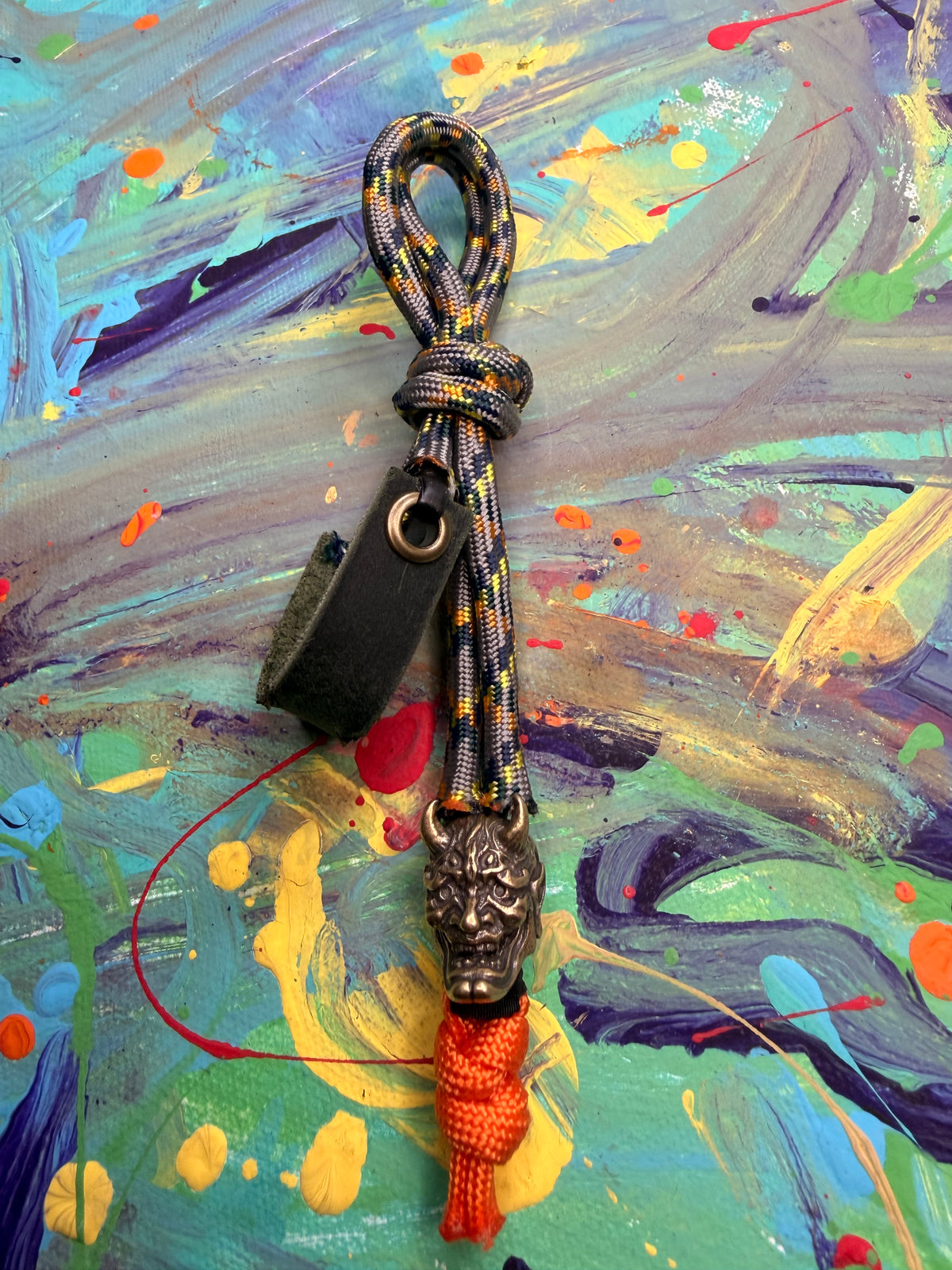 Gray Camo Paracord EDC - Frameless Slingshot w/ Horned Mask Charm - Green Leather