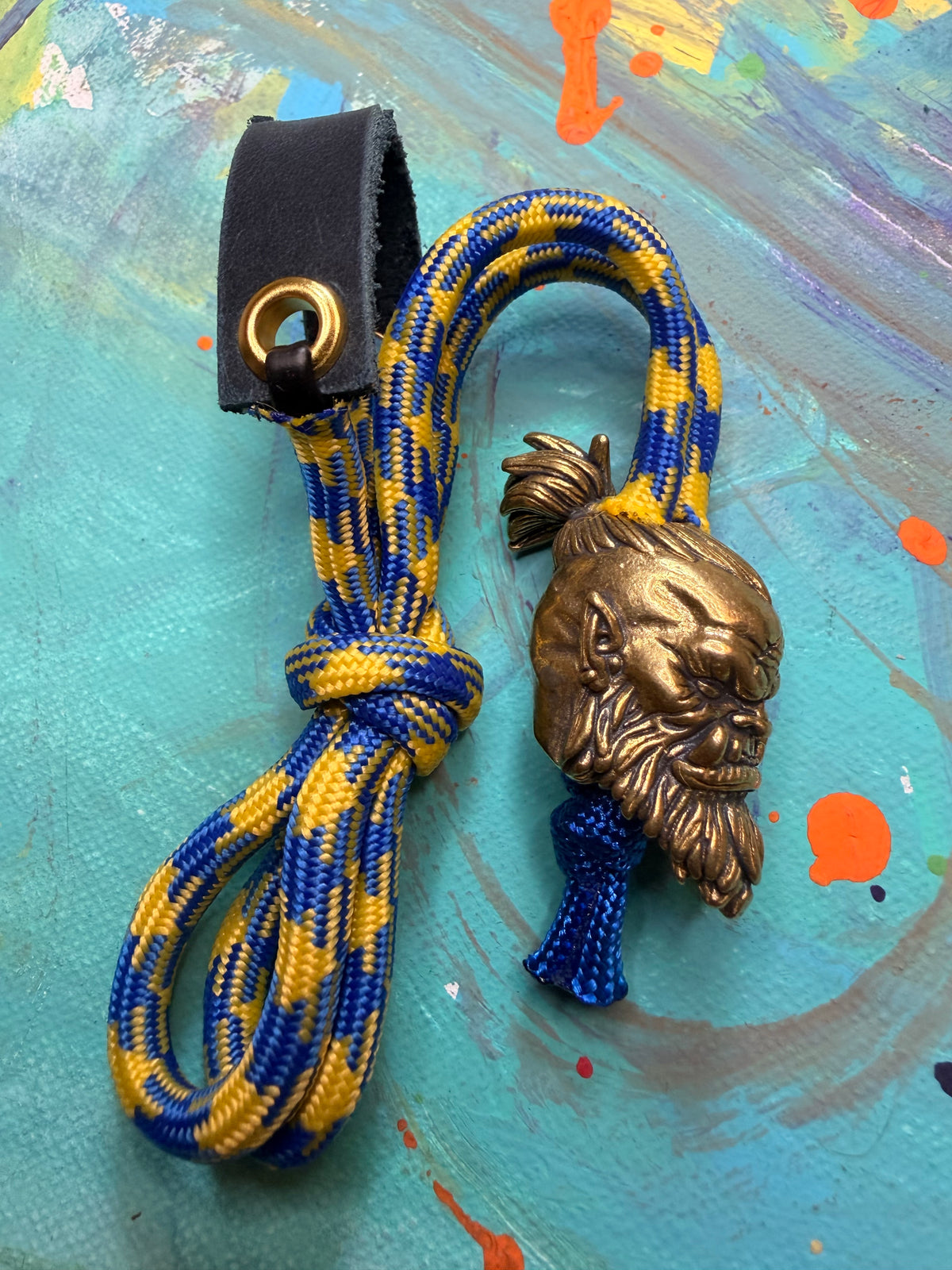Blue Yellow Paracord EDC - Frameless Slingshot w/ Large Orc Head - Blue Leather