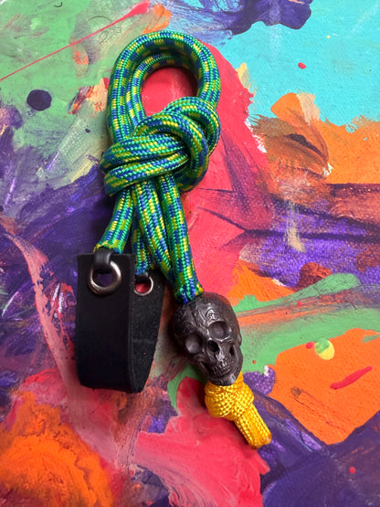 Green & Blue Paracord EDC - Frameless Slingshot w/ Black Skull Charm- Black Leather