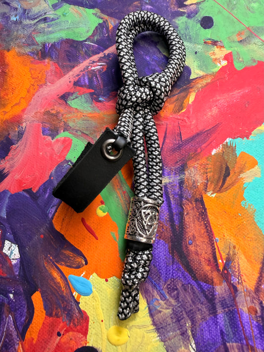White & Black Paracord EDC - Frameless Slingshot w/ Nordic Charm - Black Leather