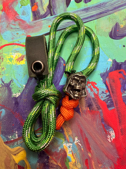 Green & Red Paracord EDC - Frameless Slingshot w/ Skeletor Charm- Green Leather
