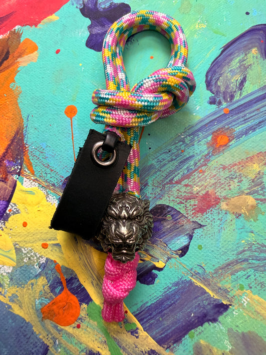 Pink/Yellow/Blue Paracord EDC - Frameless Slingshot w/ Tiger Charm - Black Leather