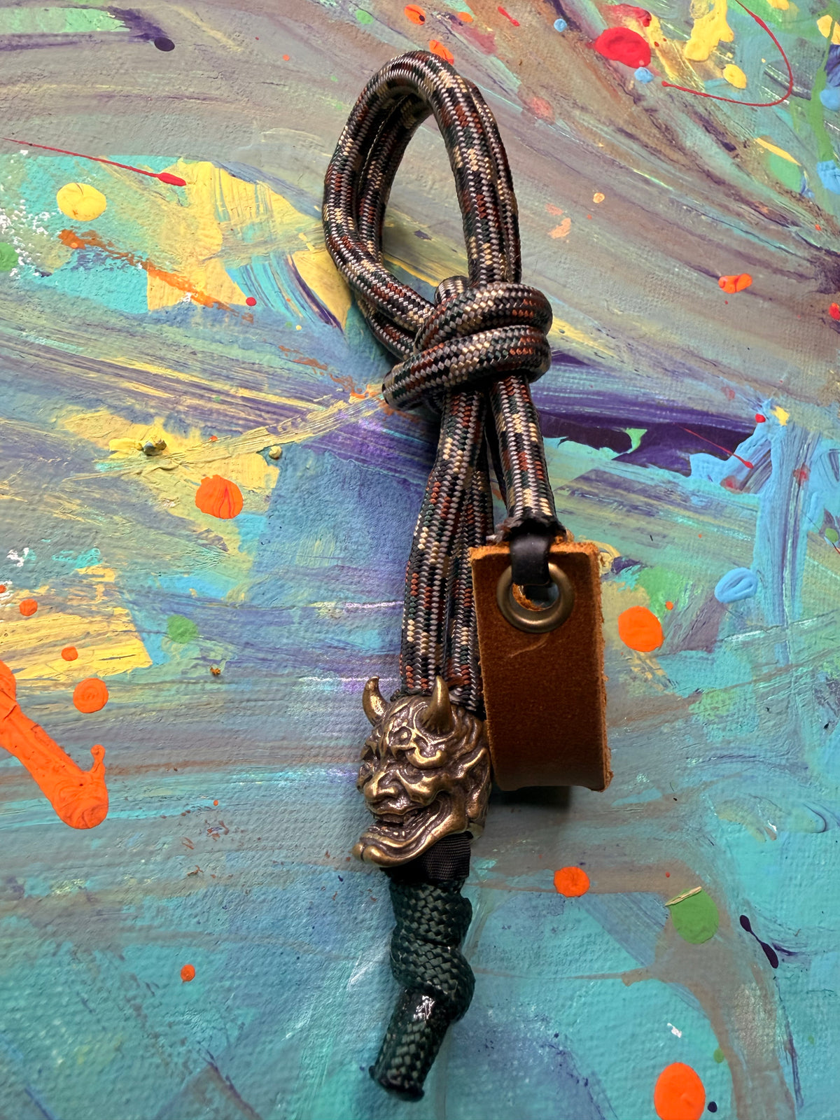 Dark Camo Paracord EDC - Frameless Slingshot w/ Horned Mask Charm - Genuine Leather