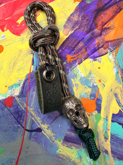 Dark Camo Paracord EDC - Frameless Slingshot w/ Skull Charm- Green Leather