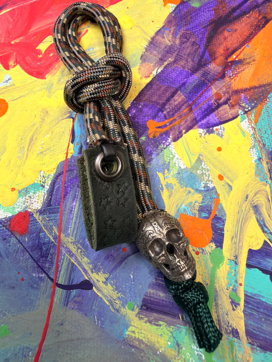 Dark Camo Paracord EDC - Frameless Slingshot w/ Skull Charm- Green Leather