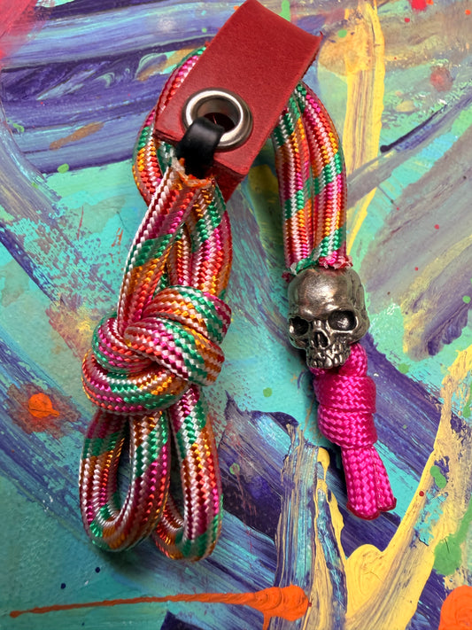 Rainbow Paracord EDC - Frameless Slingshot w/ Jawless Skull Charm - Red Leather