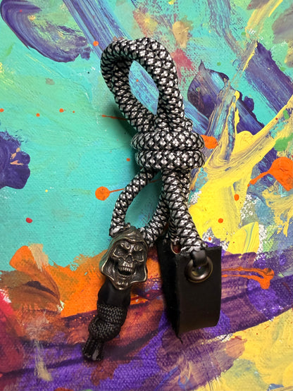 Black & White Paracord EDC - Frameless Slingshot w/ Skeletor Charm- Black Leather