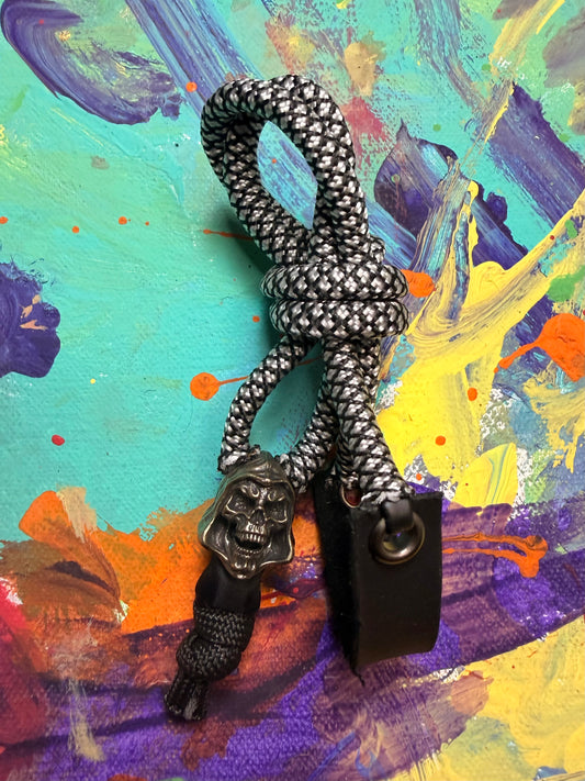 Black & White Paracord EDC - Frameless Slingshot w/ Skeletor Charm- Black Leather