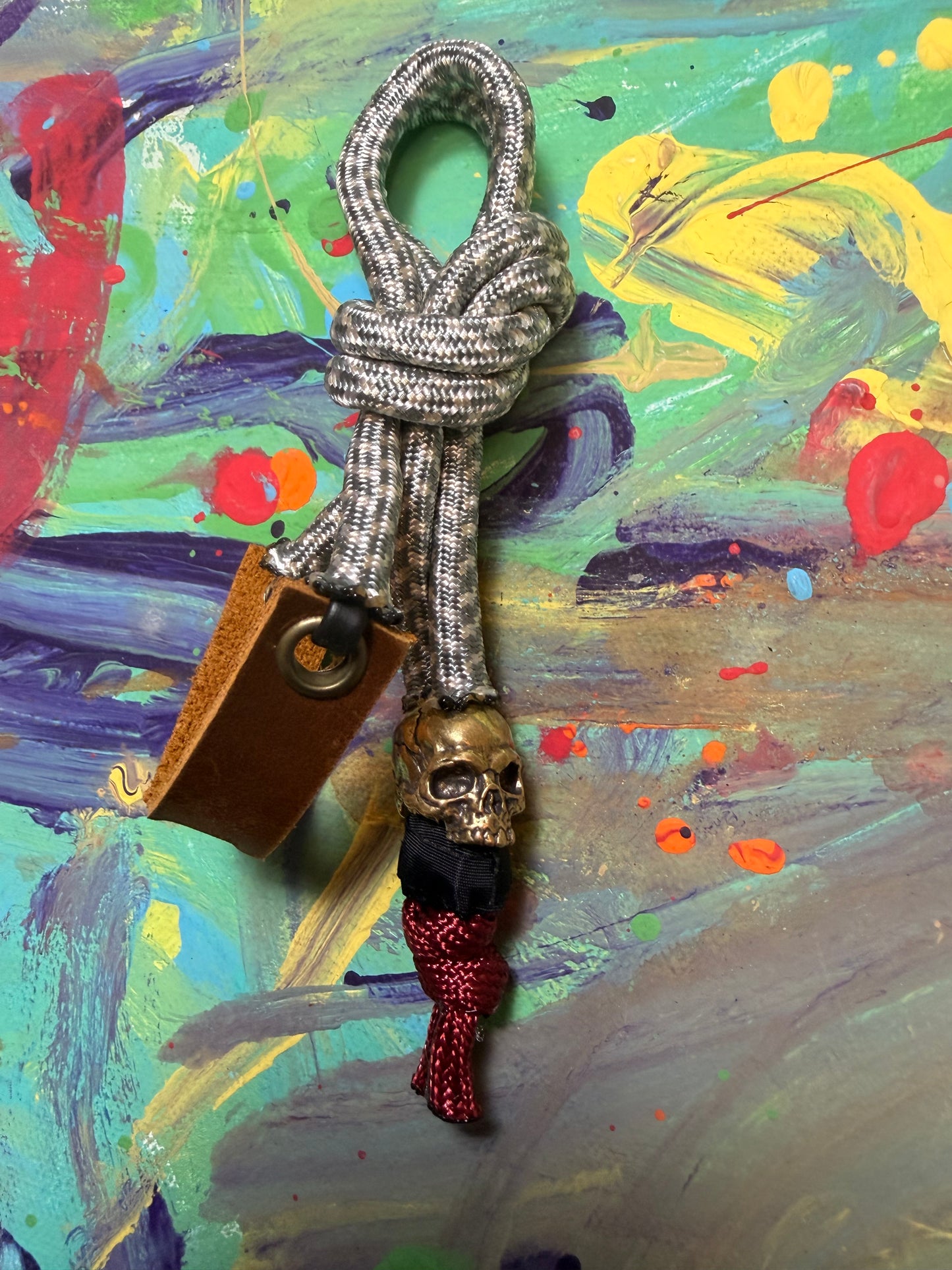 Gray & White Paracord EDC - Frameless Slingshot w/ jawless Skull Charm - Genuine Leather