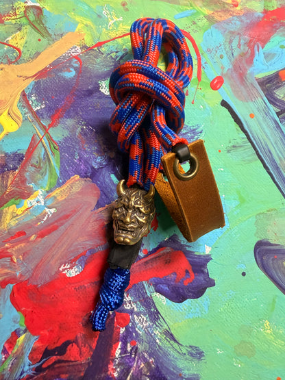 Blue & White Paracord EDC - Frameless Slingshot w/ Horned Mask Charm - Genuine Leather