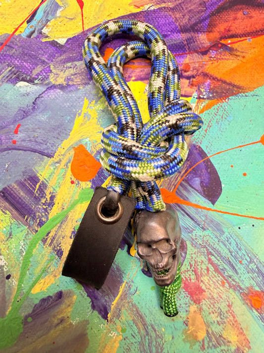 Blue Multicolor Paracord EDC - Frameless Slingshot w/ Bronze Skull Charm- Black Leather