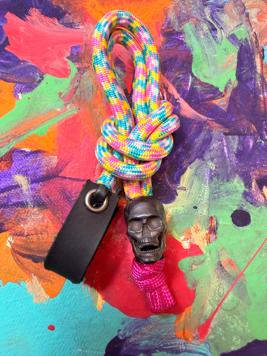 Pink/Yellow/Green Paracord EDC - Frameless Slingshot w/ Skull Charm - Black Leather