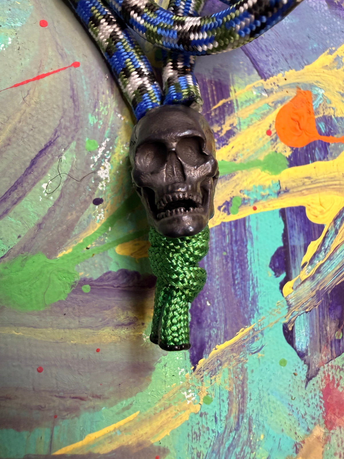 Blue Multicolor Paracord EDC - Frameless Slingshot w/ Bronze Skull Charm- Black Leather