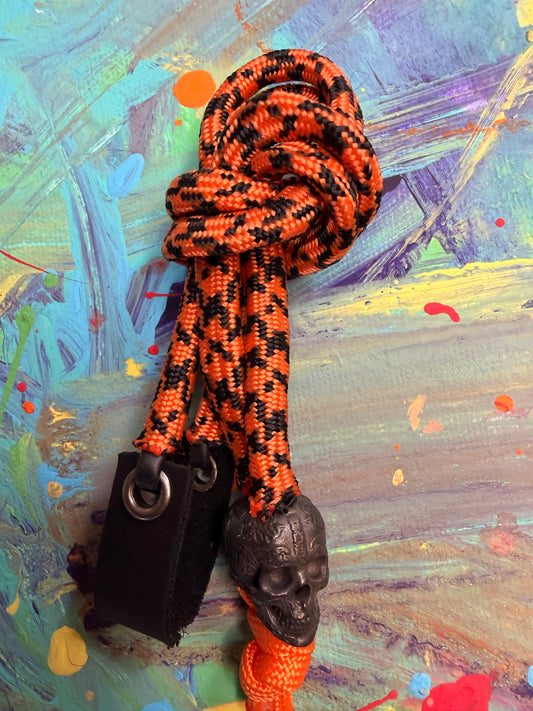 Orange & Black Paracord EDC - Frameless Slingshot w/ Black Skull Charm- Black Leather