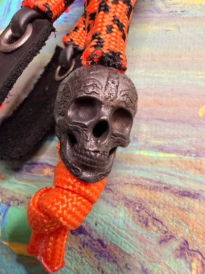 Orange & Black Paracord EDC - Frameless Slingshot w/ Black Skull Charm- Black Leather