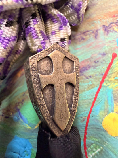 Purple & White Paracord EDC - Frameless Slingshot w/ Cross Charm - Black Leather