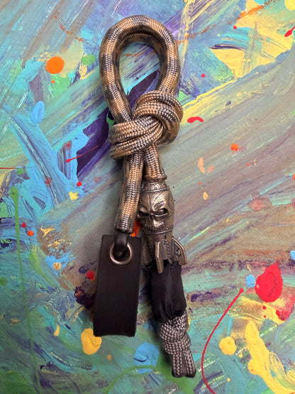 Brown & Gray Paracord EDC - Frameless Slingshot w/ Bomb Skull Charm - Black Leather
