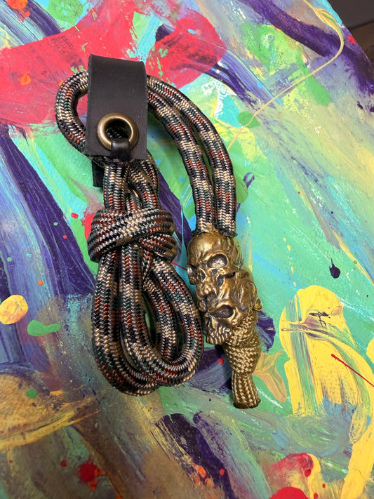 Dark Camo Paracord EDC - Frameless Slingshot w/ Double Skull Charm - Black Leather